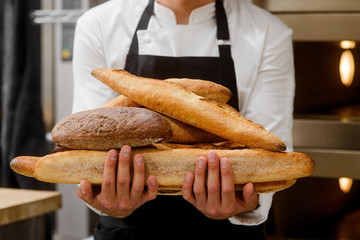 Baker is showing breads