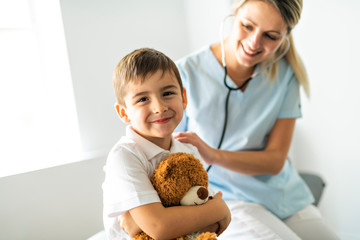 A cute Child Patient Visiting Doctor's Office