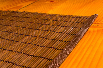 bamboo Mat - stand food, close-up, wooden background