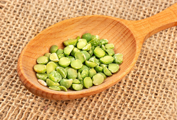 Dry green peas in spoon