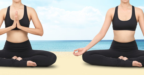 Close-up of of young woman meditating in yoga poses