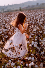 Little girl in cotton field
