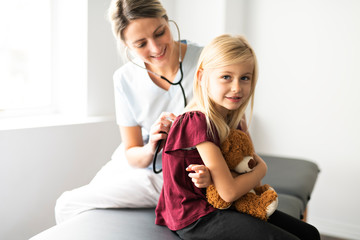 A cute Child Patient Visiting Doctor's Office