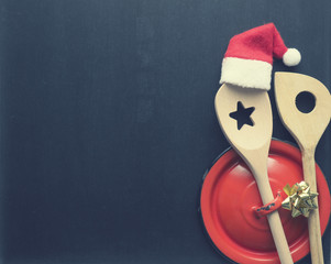 Cooking spoon with hat of santa