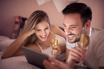 Lovely couple using a tablet