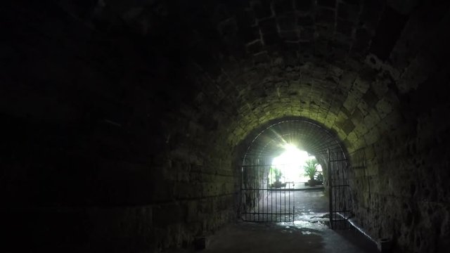 Intramuros, Manila, Philippines - September 6, 2018: Tunnel or passage way within the walled city Founded by Miguel Lopez de Legazpi during the 16th century. tracking shot