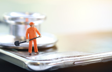 Phone with a broken screen with stethoscope, Mobile phone repair concept