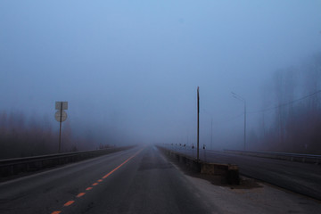 Fototapeta premium railway in fog on field