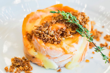 Salmon salad with potato, nuts and rosemary