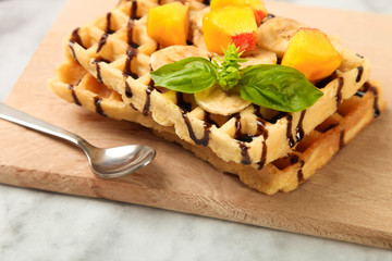 Belgian waffle with peach and banana