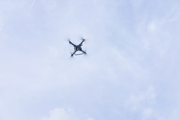 Drone against the blue sky