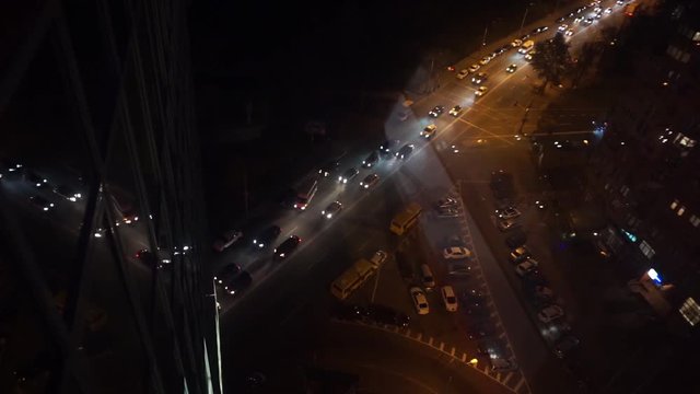 Night City Traffic Reflection in Office Windows