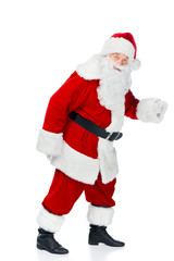 bearded santa claus walking in red costume isolated on white