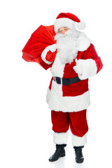 santa claus with red christmas bag showing thumb up isolated on white