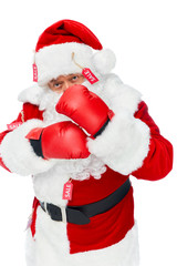 santa claus in boxing gloves and red costume with sale tags isolated on white