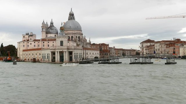 VENICE, ITALY- OCTOBER 30, 2018: view of Punta della Dogana and of the Bas&iacute;lica de Santa Maria della Salute