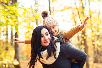 A Happy family on autumn, Mother and daughter in the Park