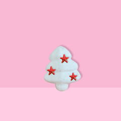 White glitter Christmas tree with red star on pink background for new year and christmas background, Minimal Concept