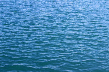 Blue clean sea water surface texture horizontal ripples background wallpaper