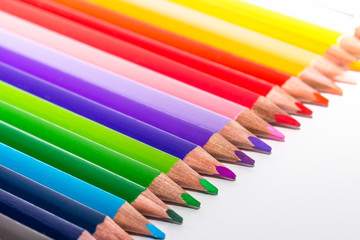 Color pencils, watercolor, water soluble. Aquarelle coloured pencils on white background. Drawing, sketching, colouring, water-soluble. Gradient. Colors of the rainbow.