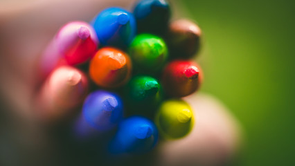 Crayon tips close-up. Shallow depth of field for dreamy impressional feel. Rainbow crayons