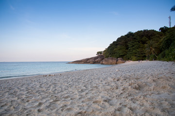 beach with rocks and sky