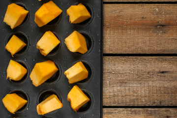 pumpkin pieces (raw orange pumpkin). Healthy food. Copy space. Diet menu. Top view