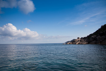 beach with rocks and sky