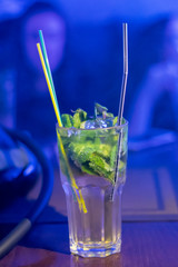 .Party, alcohol. Cocktail mojito refreshing close-up.