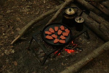 cooking meat on the grill