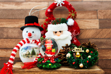 Christmas decoration and ornaments on wooden background