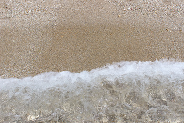 Sea water sandy beach swash wave waterline