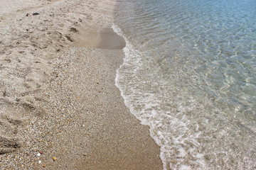 Sea water sandy beach swash shallow wave 