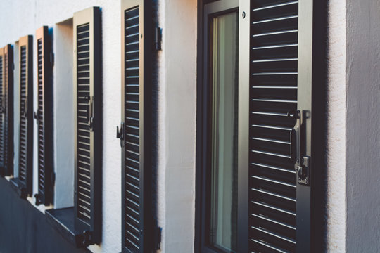 Black wooden shutters for windows