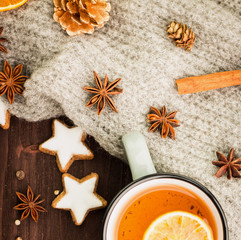 Fototapeta na wymiar Winter and New Year theme. Christmas tea with spices