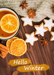Winter theme. Hot tea with spices,orange,cinnamon,anise,cookies
