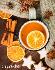 Winter theme. Hot tea with spices, orange,cinnamon,anise,cookies