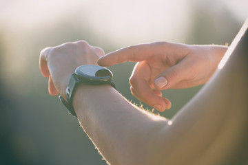 Woman is using the smartwatch
