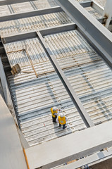 This metal platform support is used to create floors in a construction. Sheets used to construct floors and roofs in construction sites