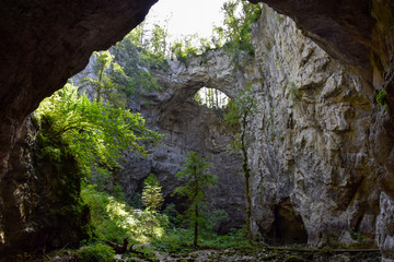 Rakov Skocjan ( Rakov Škocjan ) is a karst valley and the oldest landscape park in Slovenia. Small Natural Bridge ( Mali Naravni Most ) is most important geologic phenomena of the park. 