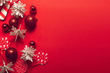 Fototapeta na wymiar decoration with season greeting merry christmas prop on red background