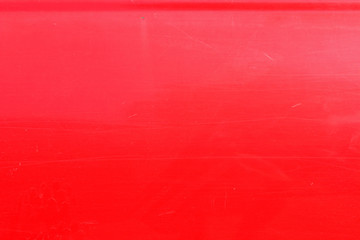 Bright red car metal paint detail scratches streaks specks lines reflection detail