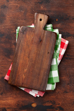 Cooking board over kitchen towel or napkin