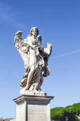 Fototapeta na wymiar statues on the bridge of saint Angel
