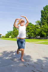 Cute girl jumping on one leg