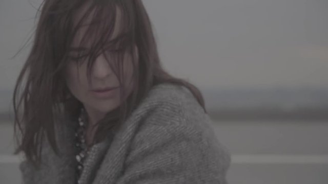 Pretty young in windy weather outdoors. Slow motion, s-log, ungraded