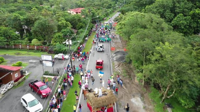 Drone flies over the streets of Anton Valley during a festival