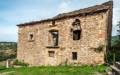Fototapeta na wymiar House in ruins in Gillue a village in the Pyrenees mountains