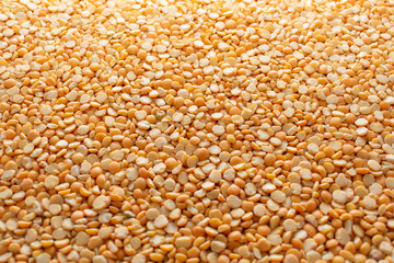 yellow dry split peas, healthy food for vegetarians as background