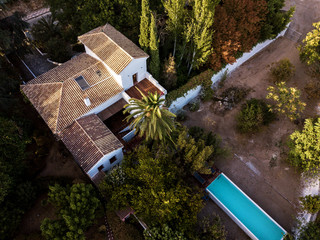 Aerial view of typical country house with pool in Andalusia, Spain